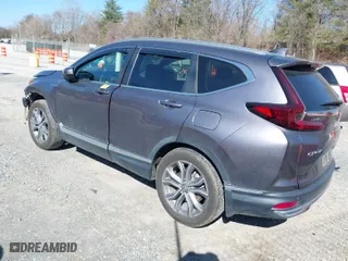 2020 Honda CR-V Hybrid Touring with VIN 7FART6H97LE024715, listed as a IAAI auction lot 41754582 with 67,498 mi miles. Bid and sale history available at carsss.com. Image 3.