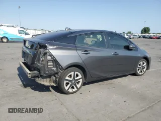 2016 Toyota Prius Four z VIN JTDKARFU1G3018102, wystawiony jako Copart lot #60045195 z przebiegiem 142 128 mil mil oraz Szkoda całkowita • Salvage title. Historia ofert i sprzedaży dostępna na DreamBid. Obrazek 3.