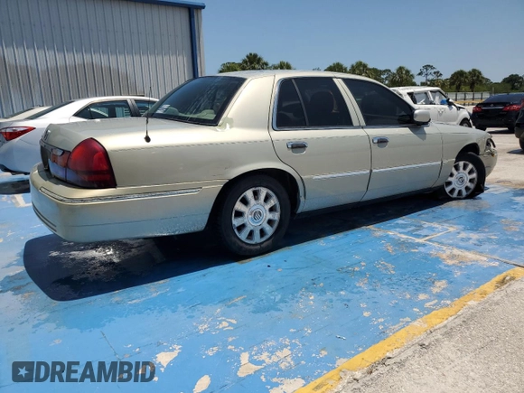 2005 Mercury Grand Marquis LS Premium z VIN 2MEFM75W45X636559, wystawiony jako Copart lot #54424415 z przebiegiem 129 643 mil mil oraz Szkoda całkowita • Salvage title. Historia ofert i sprzedaży dostępna na DreamBid. Obrazek 3.