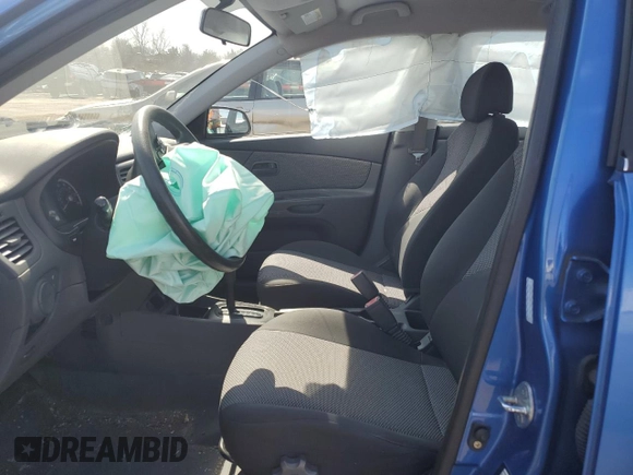 2009 Kia Rio LX with VIN KNADE243296500963, listed as a Copart auction lot 51061595 with 76,596 mi miles and Salvage Title. Bid and sale history available at carsss.com. Image 7.