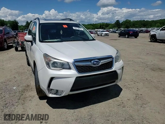2015 Subaru Forester XT Touring with VIN JF2SJGUC4FH452824, listed as a Copart auction lot 56219615 with 127,328 mi miles and Salvage title. Bid and sale history available at DreamBid. Image 14.