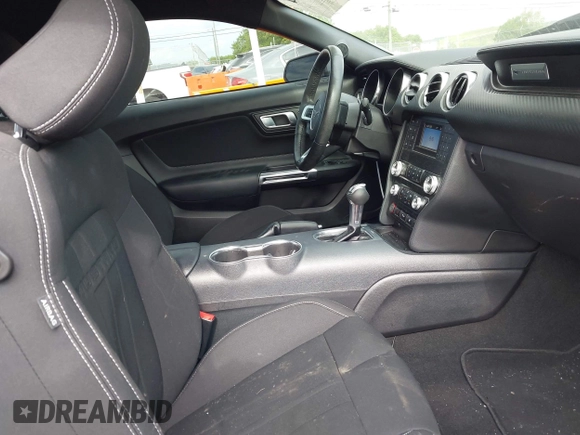 2021 Ford Mustang EcoBoost with VIN 1FA6P8TH9M5133781, listed as a IAAI auction lot 42158034 with 31,648 mi miles and . Bid and sale history available at DreamBid. Image 5.
