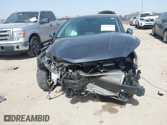 2024 Kia Forte LXS with VIN 3KPF24AD8RE800644, listed as a IAAI auction lot 41750529 with 12,339 mi miles and . Bid and sale history available at DreamBid. Image 6.