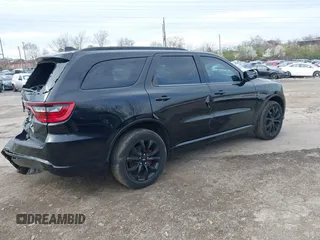 2019 Dodge Durango GT Plus with VIN 1C4RDJDG6KC561099, listed as a IAAI auction lot 41963187 with 104,153 mi miles and . Bid and sale history available at DreamBid. Image 4.