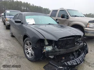 2013 Dodge Charger RT Max with VIN 2C3CDXCT1DH711065, listed as a IAAI auction lot 41512711 with 163,738 mi miles. Bid and sale history available at carsss.com. Image 1.