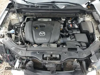 2020 Mazda CX-5 Touring z VIN JM3KFBCM2L0750223, wystawiony jako Copart lot #56300415 z przebiegiem 87 392 mil mil oraz Szkoda całkowita • Salvage title. Historia ofert i sprzedaży dostępna na DreamBid. Obrazek 12.