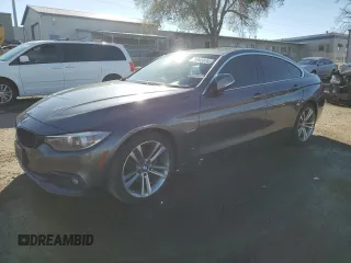 2018 BMW 4 Series 430i with VIN WBA4J1C56JBG77135, listed as a Copart auction lot 76942874 with 100,310 mi miles and Salvage Title. Bid and sale history available at carsss.com. Image 1.