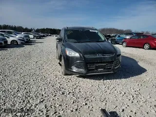 2016 Ford Escape Titanium with VIN 1FMCU9J96GUA08976, listed as a Copart auction lot 42637765 with 146,656 mi miles and Salvage Title. Bid and sale history available at carsss.com. Image 12.