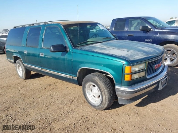 1996 GMC Suburban with VIN 1GDEC16R5TJ742543, listed as a IAAI auction lot 41910103 with 159,469 mi miles. Bid and sale history available at carsss.com. Image 1.