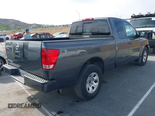 2004 Nissan Titan SE with VIN 1N6AA06A04N567056, listed as a IAAI auction lot 42044609 with 122,174 mi miles. Bid and sale history available at carsss.com. Image 4.