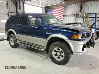 1999 Mitsubishi Montero z VIN JA4MT41R8XP039248, wystawiony jako Copart lot #58486465 z przebiegiem 183 316 mil mil oraz Szkoda całkowita • Salvage title. Historia ofert i sprzedaży dostępna na DreamBid. Obrazek 4.