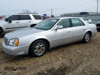 2001 Cadillac DeVille z VIN 1G6KD54Y91U295722, wystawiony jako Copart lot #50454935 z przebiegiem 128 223 mil mil oraz Szkoda całkowita • Salvage title. Historia ofert i sprzedaży dostępna na DreamBid. Obrazek 1.