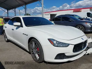 2015 Maserati Ghibli z VIN ZAM57XSA8F1161212, wystawiony jako IAAI lot #41746084 z przebiegiem 57 169 mil mil oraz . Historia ofert i sprzedaży dostępna na DreamBid. Obrazek 1.