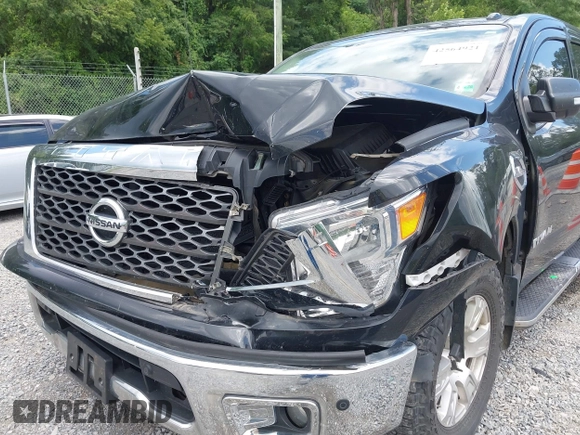 2017 Nissan Titan SV with VIN 1N6AA1E58HN542504, listed as a IAAI auction lot 42564921 with 161,555 mi miles and . Bid and sale history available at DreamBid. Image 6.