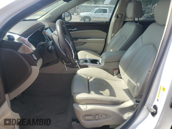 2016 Cadillac SRX Luxury Collection with VIN 3GYFNBE39GS516719, listed as a Copart auction lot 59988365 with 138,054 mi miles and Salvage title. Bid and sale history available at DreamBid. Image 7.