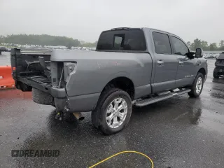 2016 Nissan Titan SL with VIN 1N6BA1F48GN511567, listed as a Copart auction lot 57864775 with 141,545 mi miles and Salvage title. Bid and sale history available at DreamBid. Image 3.