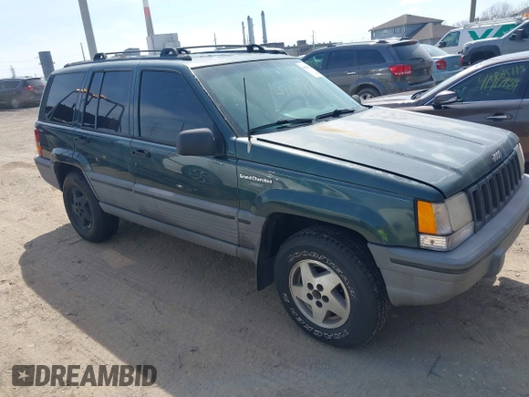 1994 Jeep Grand Cherokee Laredo with VIN 1J4GZ58S0RC266616, listed as a IAAI auction lot 41890812 with 190,000 mi miles. Bid and sale history available at carsss.com. Image 1.