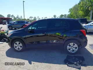 2019 Chevrolet Trax LS with VIN 3GNCJKSBXKL164776, listed as a IAAI auction lot 42064236 with 117,111 mi miles. Bid and sale history available at carsss.com. Image 14.