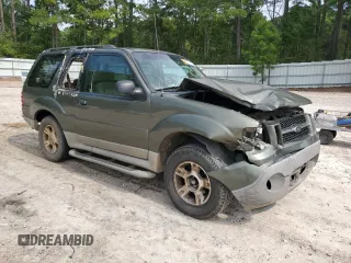 2003 Ford Explorer Sport XLS z VIN 1FMYU60E03UC12105, wystawiony jako Copart lot #67044604 z przebiegiem 277 642 mil mil oraz Szkody całkowita. Historia ofert i sprzedaży dostępna na DreamBid. Obrazek 4.
