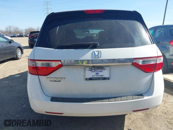 2011 Honda Odyssey EX-L with VIN 5FNRL5H69BB062666, listed as a IAAI auction lot 41829319 with 152,105 mi miles and . Bid and sale history available at carsss.com. Image 16.