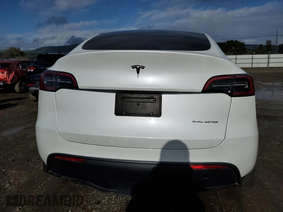 2023 Tesla Model Y Long Range with VIN 7SAYGDEEXPF844622, listed as a Copart auction lot 49094465 with 35,191 mi miles and Salvage Title. Bid and sale history available at DreamBid. Image 6.