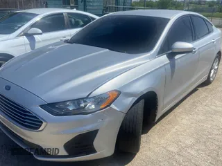 2019 Ford Fusion Hybrid SE with VIN 3FA6P0LU7KR241731, listed as a Copart auction lot 49031303 with 73,210 mi miles. Bid and sale history available at carsss.com. Image 2.