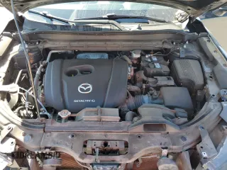 2021 Mazda CX-5 Touring z VIN JM3KFBCM8M0321766, wystawiony jako Copart lot #52845085 z przebiegiem 115 627 mil mil oraz Szkody całkowita. Historia ofert i sprzedaży dostępna na DreamBid. Obrazek 12.