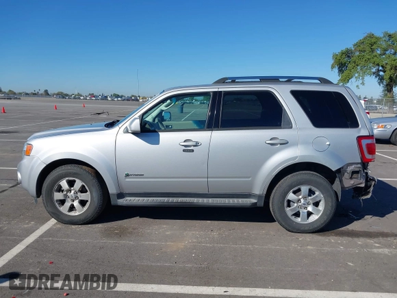 2009 Ford Escape Hybrid with VIN 1FMCU59349KA94375, listed as a IAAI auction lot 41865743 with 127,538 mi miles and . Bid and sale history available at DreamBid. Image 14.