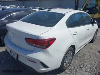 2023 Kia Rio S with VIN 3KPA24AD4PE573279, listed as a IAAI auction lot 41885298 with 11,561 mi miles. Bid and sale history available at carsss.com. Image 4.