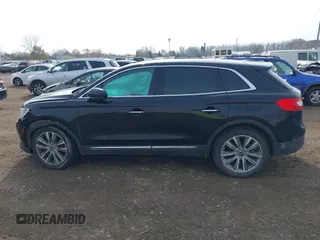 2016 Lincoln MKX Reserve with VIN 2LMTJ8LP3GBL71597, listed as a IAAI auction lot 40722178 with 230,704 mi miles. Bid and sale history available at carsss.com. Image 14.