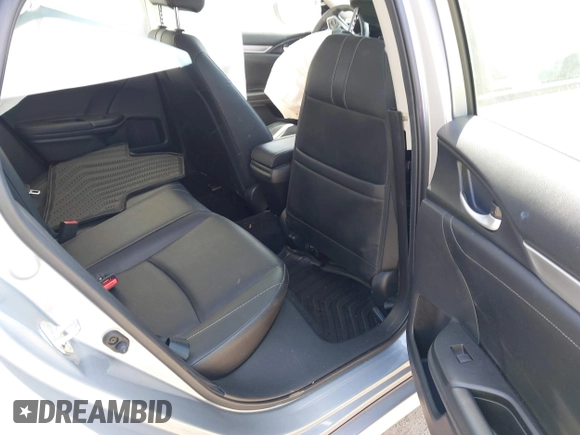 2018 Honda Civic EX-L with VIN JHMFC1F72JX043788, listed as a IAAI auction lot 41853131 with 137,266 mi miles and . Bid and sale history available at DreamBid. Image 8.