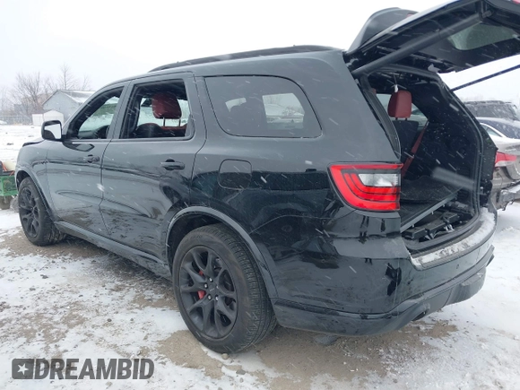 2023 Dodge Durango SRT 392 Premium with VIN 1C4SDJGJXPC681939, listed as a IAAI auction lot 41015100 with 12,562 mi miles and . Bid and sale history available at DreamBid. Image 3.