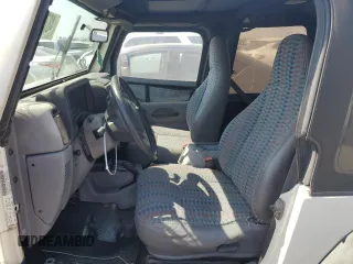 1997 Jeep Wrangler SE with VIN 1J4FY29PXVP411817, listed as a Copart auction lot 48755615 with 125,284 mi miles and Salvage Title. Bid and sale history available at DreamBid. Image 7.