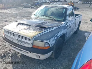 1998 Dodge Dakota SLT z VIN 1B7FL26X7WS586596, wystawiony jako IAAI lot #41745358 z przebiegiem 173 950 mil mil oraz . Historia ofert i sprzedaży dostępna na DreamBid. Obrazek 2.