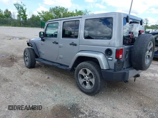 2018 Jeep Wrangler Unlimited Sahara with VIN 1C4BJWEGXJL806832, listed as a IAAI auction lot 42605892 with 90,535 mi miles and . Bid and sale history available at DreamBid. Image 3.