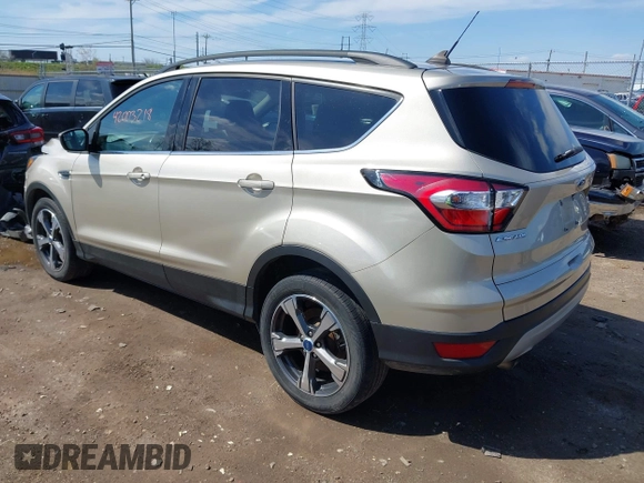 2018 Ford Escape SEL with VIN 1FMCU9HD1JUD49543, listed as a IAAI auction lot 42003218 with 122,768 mi miles. Bid and sale history available at carsss.com. Image 3.