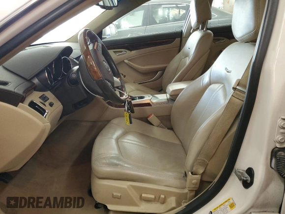 2012 Cadillac CTS Luxury with VIN 1G6DG5E57C0125969, listed as a Copart auction lot 49002865 with 105,800 mi miles and Salvage Title. Bid and sale history available at DreamBid. Image 7.