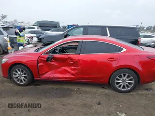 2016 Mazda 6 i Sport with VIN JM1GJ1U54G1457194, listed as a IAAI auction lot 41725704 with 109,628 mi miles and . Bid and sale history available at DreamBid. Image 14.