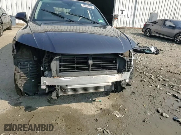 2018 Audi Q5 Premium with VIN WA1ANAFY4J2218404, listed as a Copart auction lot 60293695 with 80,767 mi miles and Salvage title. Bid and sale history available at DreamBid. Image 14.