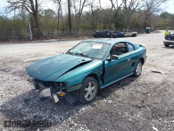 1996 Ford Mustang with VIN 1FALP4041TF145381, listed as a IAAI auction lot 41754114 with 185,072 mi miles. Bid and sale history available at carsss.com. Image 2.