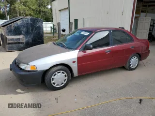 2000 Mitsubishi Mirage DE z VIN JA3AY26C1YU026930, wystawiony jako Copart lot #74153834 z przebiegiem 126 800 mil mil oraz Czysty tytuł • Clean title. Historia ofert i sprzedaży dostępna na DreamBid. Obrazek 1.