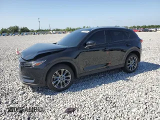 2021 Mazda CX-5 Signature with VIN JM3KFBEY5M0439676, listed as a Copart auction lot 52823285 with 41,811 mi miles and Non Repairable. Bid and sale history available at carsss.com. Image 1.