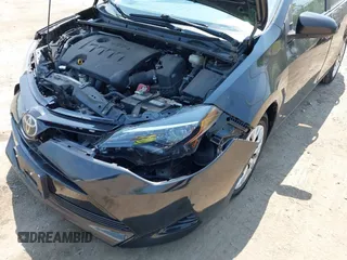 2018 Toyota Corolla L with VIN 2T1BURHE6JC041032, listed as a IAAI auction lot 42387981 with 48,094 mi miles and . Bid and sale history available at DreamBid. Image 6.