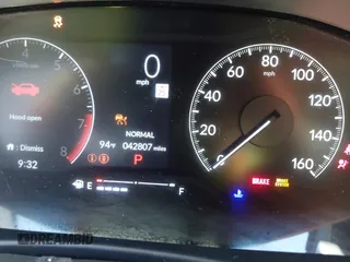 2023 Honda Civic Sport z VIN 2HGFE2F54PH559259, wystawiony jako IAAI lot #42201601 z przebiegiem 42 807 mil mil oraz . Historia ofert i sprzedaży dostępna na DreamBid. Obrazek 16.