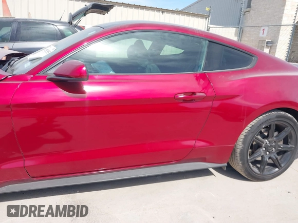 2018 Ford Mustang EcoBoost z VIN 1FA6P8TH2J5137943, wystawiony jako IAAI lot #41782395 z przebiegiem 148 809 mil mil oraz . Historia ofert i sprzedaży dostępna na DreamBid. Obrazek 13.