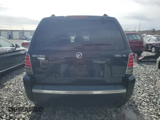 2005 Mercury Mariner Luxury z VIN 4M2CU57155DJ10663, wystawiony jako Copart lot #49102695 z przebiegiem 122 025 mil mil oraz Nie do naprawy. Historia ofert i sprzedaży dostępna na DreamBid. Obrazek 6.