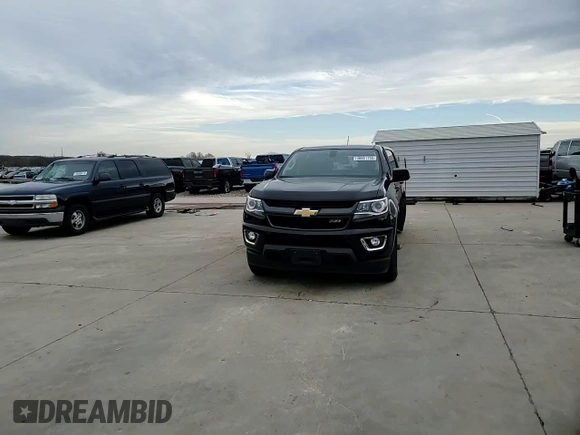 2015 Chevrolet Colorado 2WD Z71 with VIN 1GCGSCE35F1123132, listed as a Copart auction lot 48001755 with 21,075 mi miles and Clean title. Bid and sale history available at DreamBid. Image 13.