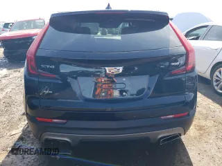 2021 Cadillac XT4 AWD Premium Luxury with VIN 1GYFZDR41MF002835, listed as a Copart auction lot 49384424 with 9,984 mi miles and Salvage Title. Bid and sale history available at carsss.com. Image 6.