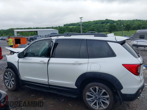 2019 Honda Passport Elite with VIN 5FNYF8H0XKB005151, listed as a IAAI auction lot 42322644 with 124,274 mi miles and . Bid and sale history available at DreamBid. Image 15.