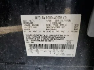 2015 Ford Edge Titanium z VIN 2FMTK4K88FBB56310, wystawiony jako Copart lot #53851524 z przebiegiem 170 380 mil mil oraz Szkody całkowita. Historia ofert i sprzedaży dostępna na DreamBid. Obrazek 13.
